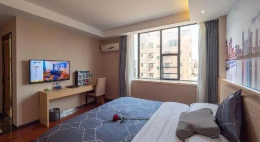 Bed in Chonpines Hotel Shenzhen Gongming Honghuashan Metro Station