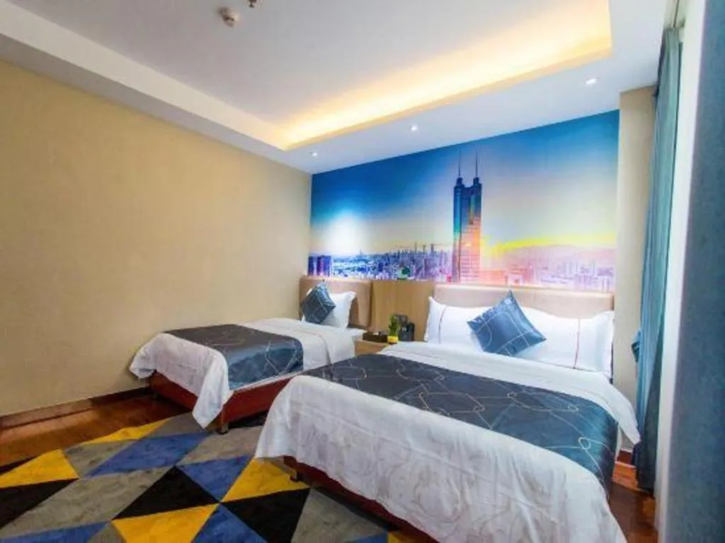 Bed in Chonpines Hotel Shenzhen Gongming Honghuashan Metro Station