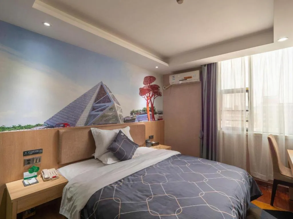 Bed in Chonpines Hotel Shenzhen Gongming Honghuashan Metro Station