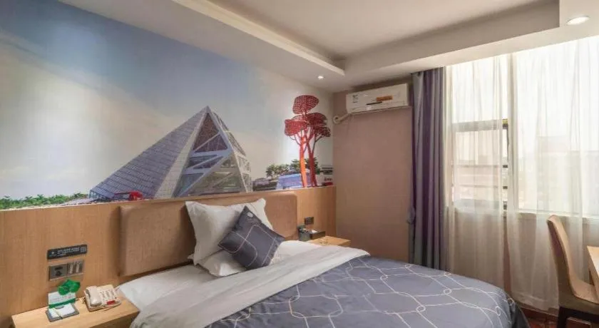 Bed in Chonpines Hotel Shenzhen Gongming Honghuashan Metro Station