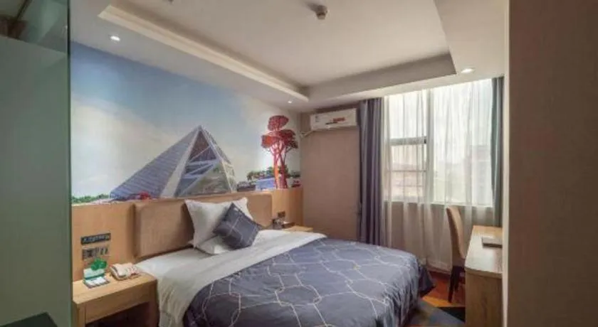 Bed in Chonpines Hotel Shenzhen Gongming Honghuashan Metro Station