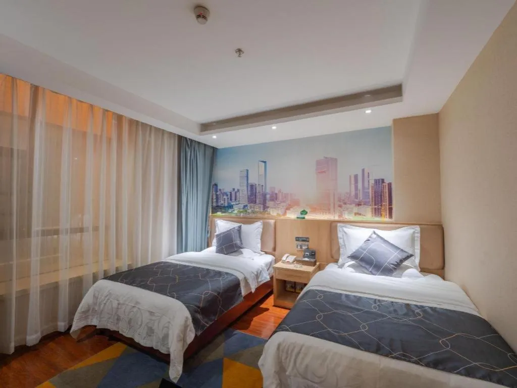 Bed in Chonpines Hotel Shenzhen Gongming Honghuashan Metro Station