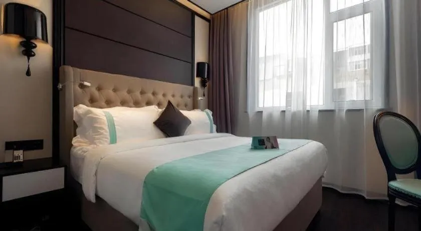 Bed in Xana Hotelle·Lianyungang Donghai