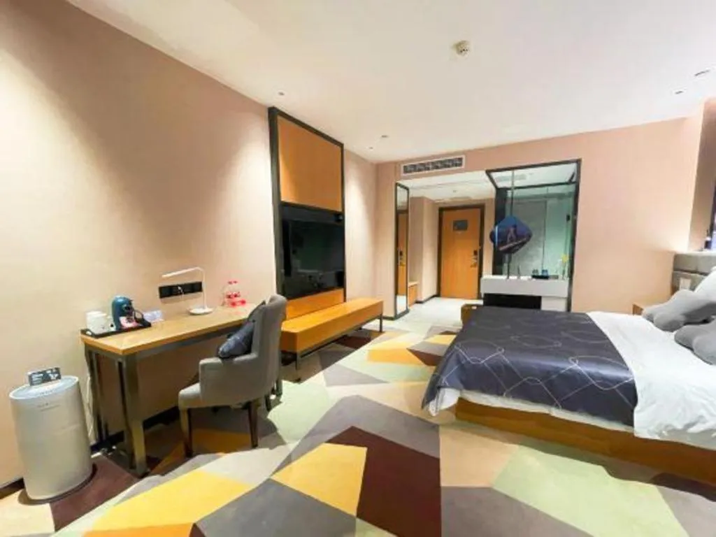 Bed in Chonpines Hotel Guangzhou Sunac Cultural and Tourism City Shiling