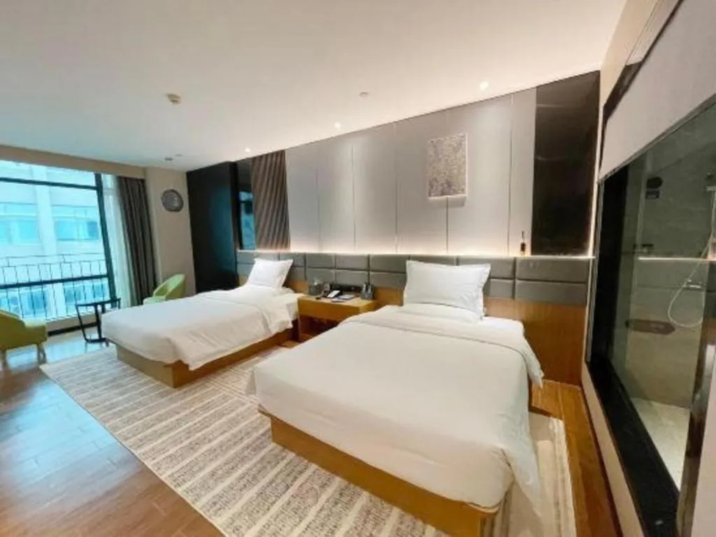 Bed in Chonpines Hotel Guangzhou Sunac Cultural and Tourism City Shiling