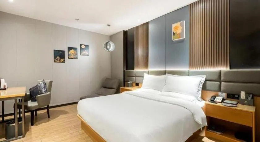 Bed in Chonpines Hotel Guangzhou Sunac Cultural and Tourism City Shiling