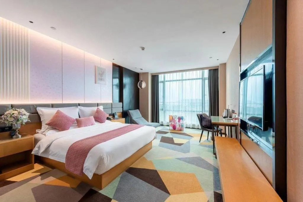 Bed in Chonpines Hotel Guangzhou Sunac Cultural and Tourism City Shiling