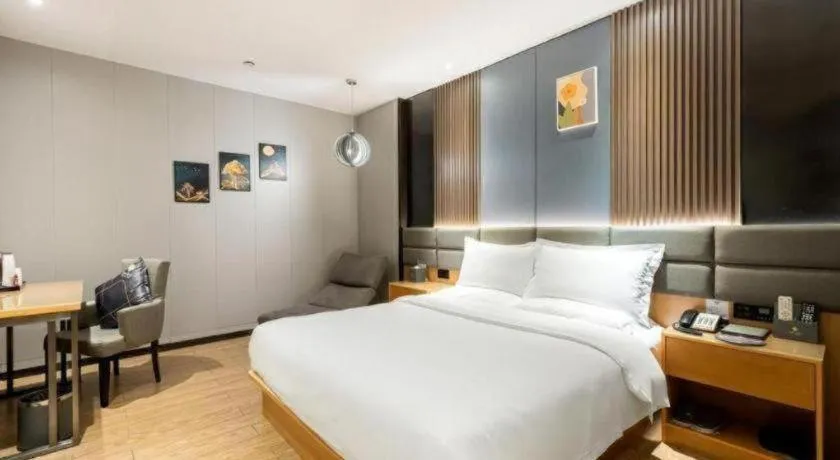 Bed in Chonpines Hotel Guangzhou Sunac Cultural and Tourism City Shiling