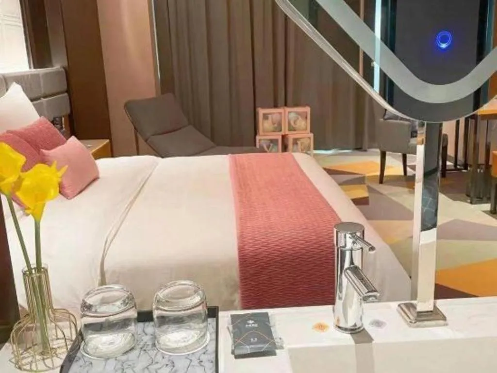 Bed in Chonpines Hotel Guangzhou Sunac Cultural and Tourism City Shiling