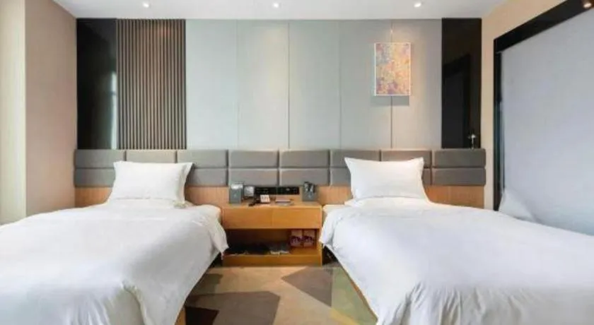 Bed in Chonpines Hotel Guangzhou Sunac Cultural and Tourism City Shiling
