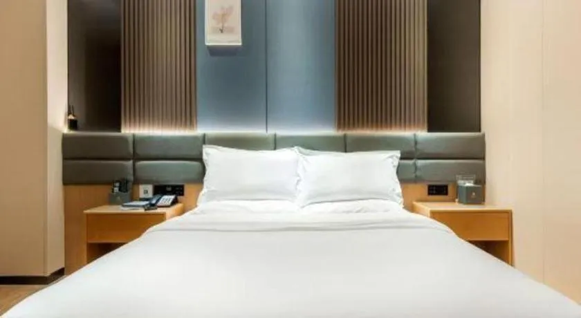 Bed in Chonpines Hotel Guangzhou Sunac Cultural and Tourism City Shiling