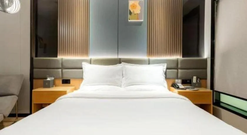 Bed in Chonpines Hotel Guangzhou Sunac Cultural and Tourism City Shiling