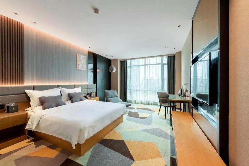 Bed in Chonpines Hotel Guangzhou Sunac Cultural and Tourism City Shiling