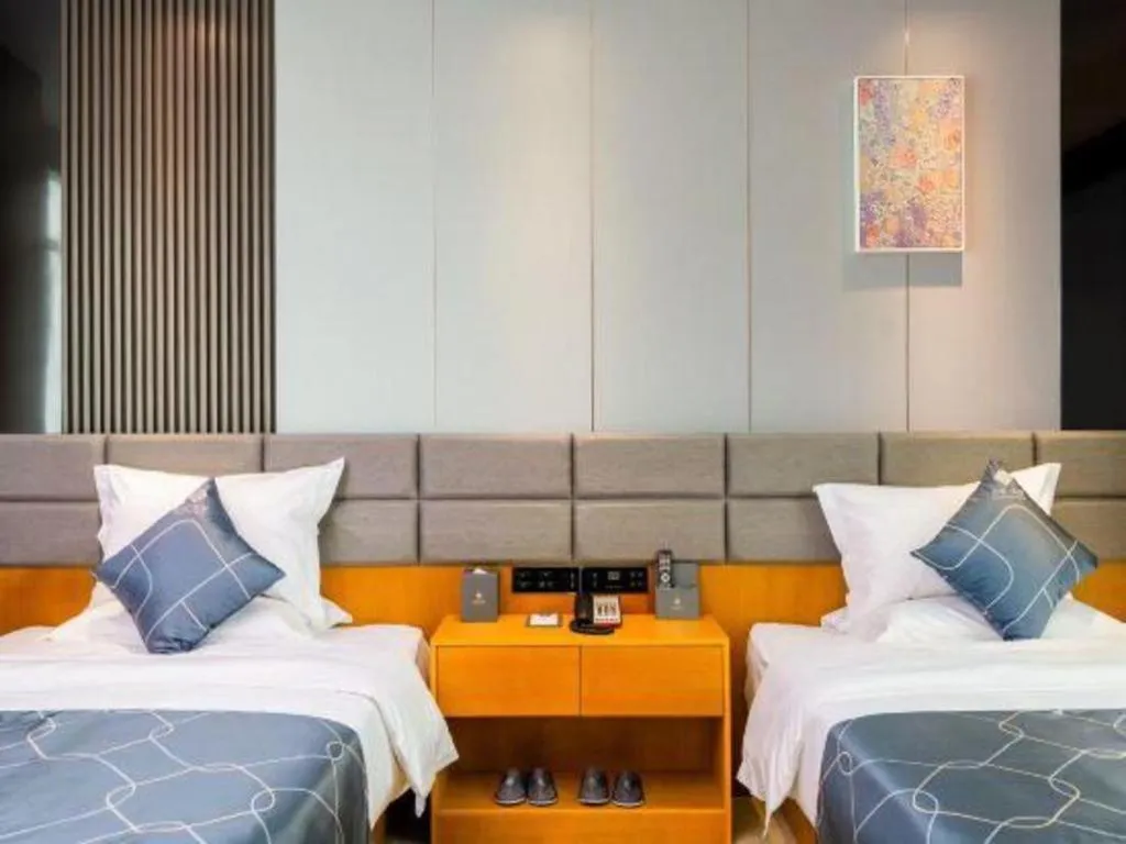 Bed in Chonpines Hotel Guangzhou Sunac Cultural and Tourism City Shiling