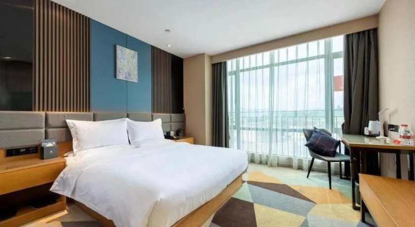 Bed in Chonpines Hotel Guangzhou Sunac Cultural and Tourism City Shiling