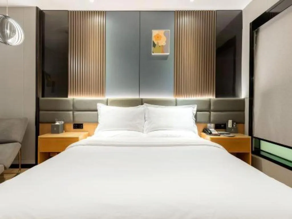 Bed in Chonpines Hotel Guangzhou Sunac Cultural and Tourism City Shiling