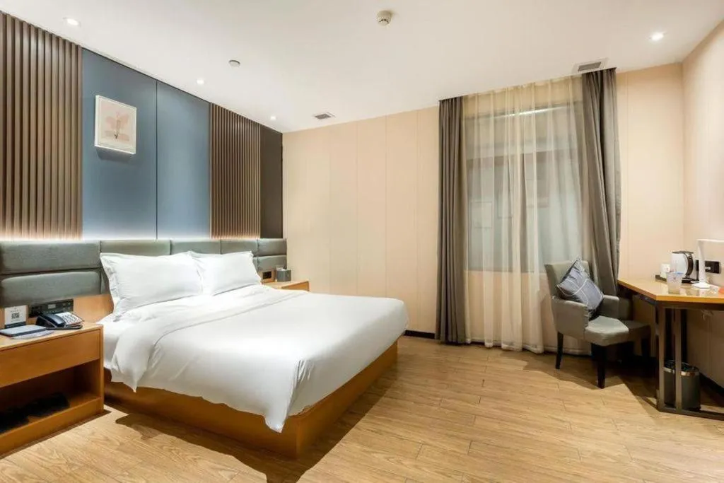 Bed in Chonpines Hotel Guangzhou Sunac Cultural and Tourism City Shiling