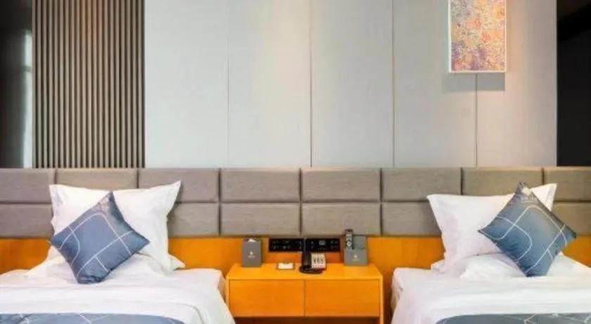Bed in Chonpines Hotel Guangzhou Sunac Cultural and Tourism City Shiling