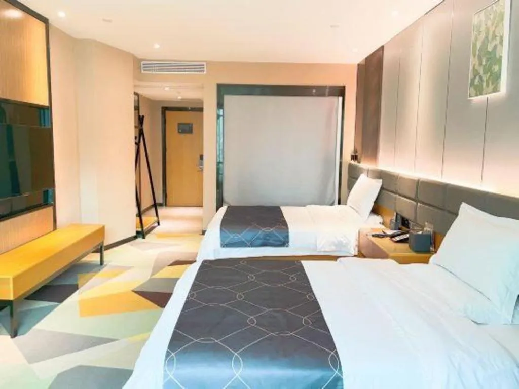 Bed in Chonpines Hotel Guangzhou Sunac Cultural and Tourism City Shiling