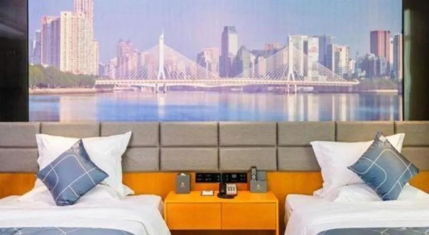 Bed in Chonpines Hotel Guangzhou Sunac Cultural and Tourism City Shiling