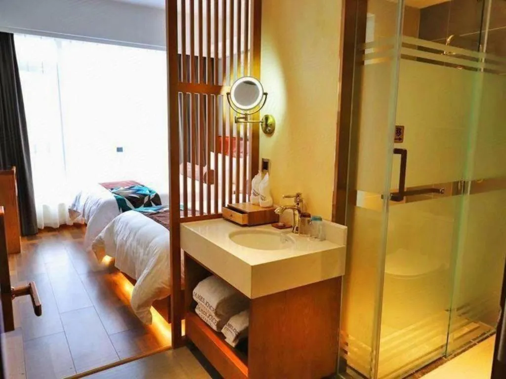 Bed in James Joyce Coffetel Guangyuan High-Speed Railway Station Dongba Municipal Government