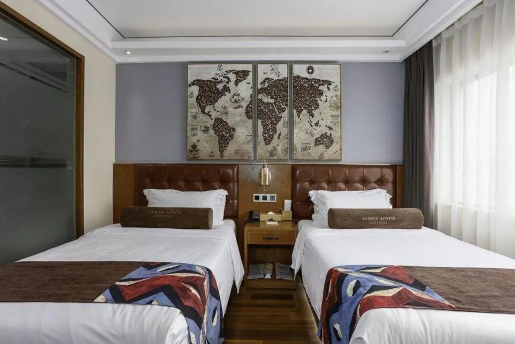 Bed in James Joyce Coffetel Guangyuan High-Speed Railway Station Dongba Municipal Government