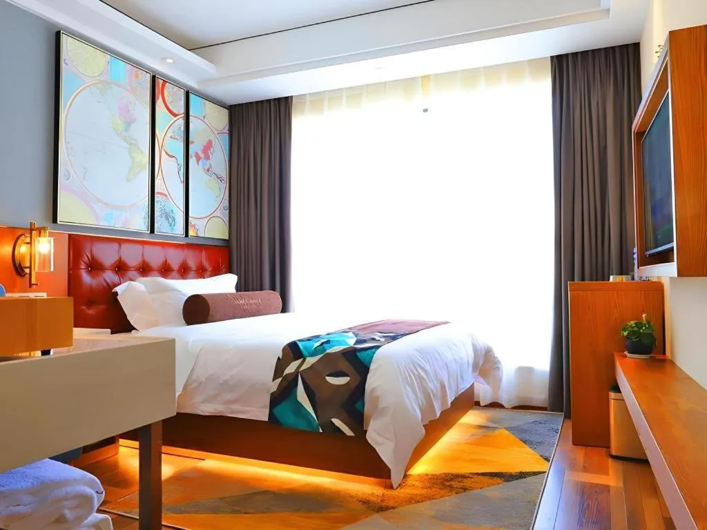 Bed in James Joyce Coffetel Guangyuan High-Speed Railway Station Dongba Municipal Government