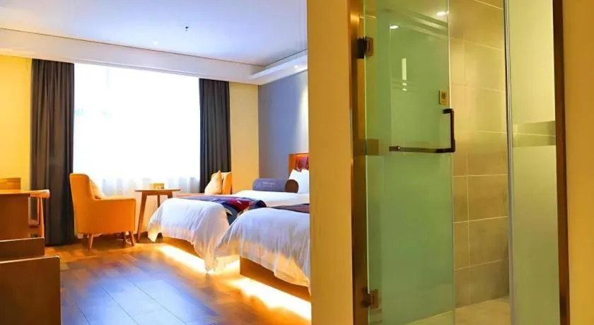 Bed in James Joyce Coffetel Guangyuan High-Speed Railway Station Dongba Municipal Government