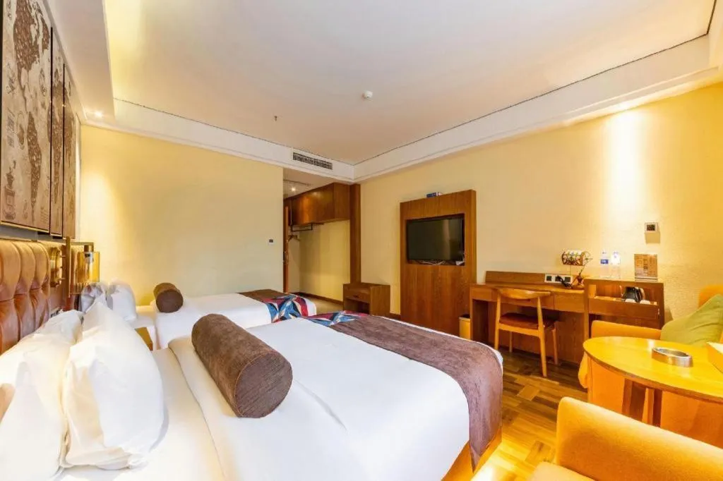 Bed in James Joyce Coffetel Guangyuan High-Speed Railway Station Dongba Municipal Government