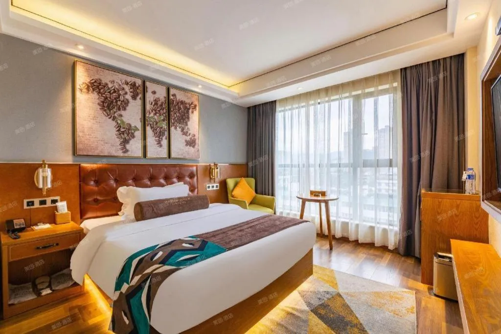 Bed in James Joyce Coffetel Guangyuan High-Speed Railway Station Dongba Municipal Government