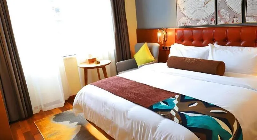 Bed in James Joyce Coffetel Guangyuan High-Speed Railway Station Dongba Municipal Government