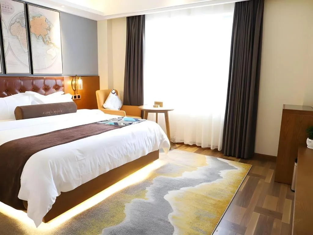 Bed in James Joyce Coffetel Guangyuan High-Speed Railway Station Dongba Municipal Government