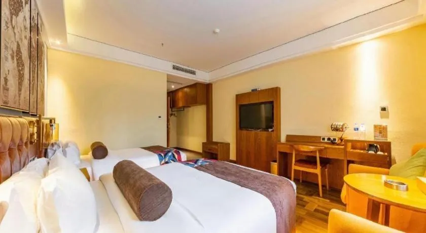 Bed in James Joyce Coffetel Guangyuan High-Speed Railway Station Dongba Municipal Government