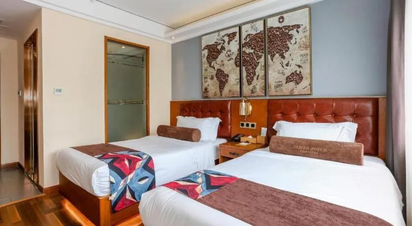 Bed in James Joyce Coffetel Guangyuan High-Speed Railway Station Dongba Municipal Government