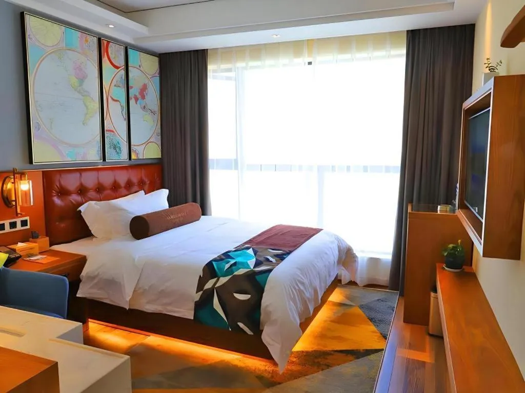 Bed in James Joyce Coffetel Guangyuan High-Speed Railway Station Dongba Municipal Government