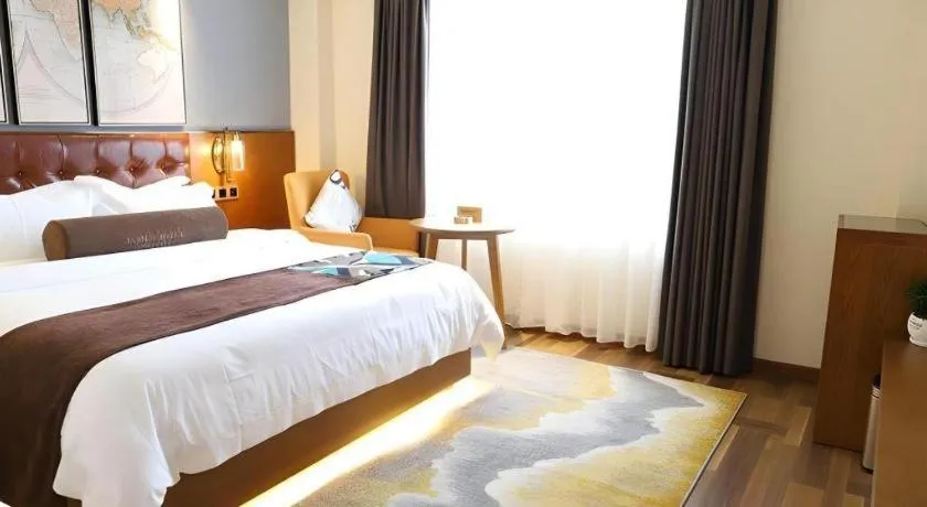 Bed in James Joyce Coffetel Guangyuan High-Speed Railway Station Dongba Municipal Government