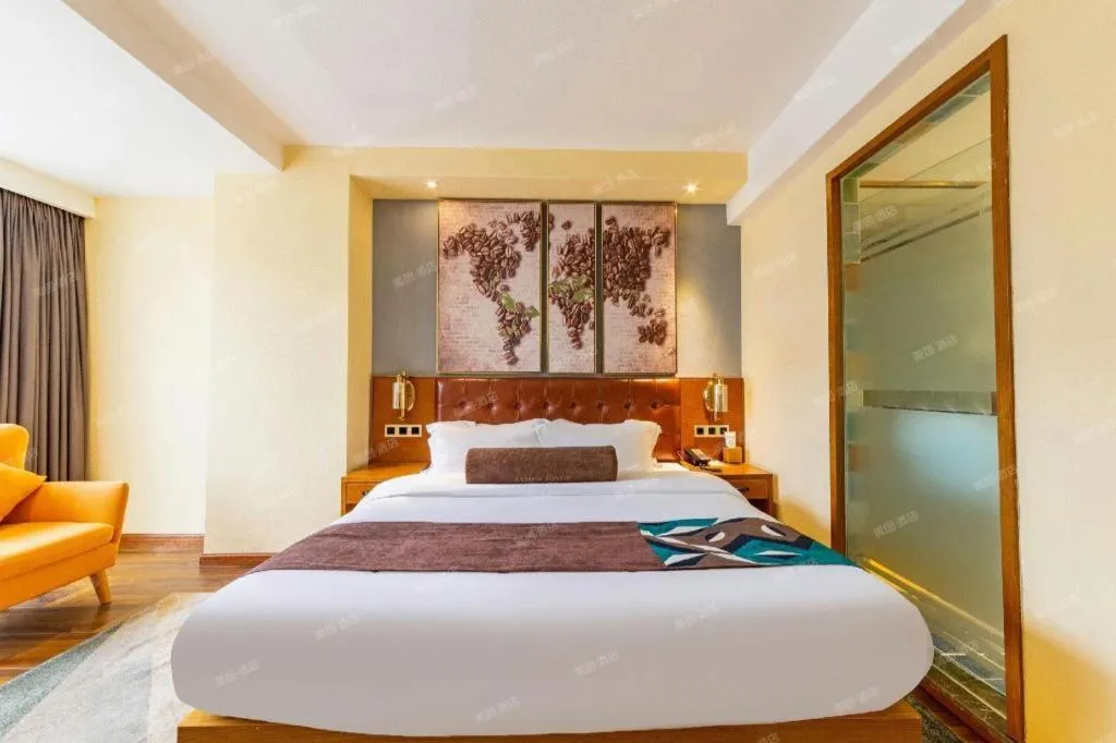 Bed in James Joyce Coffetel Guangyuan High-Speed Railway Station Dongba Municipal Government