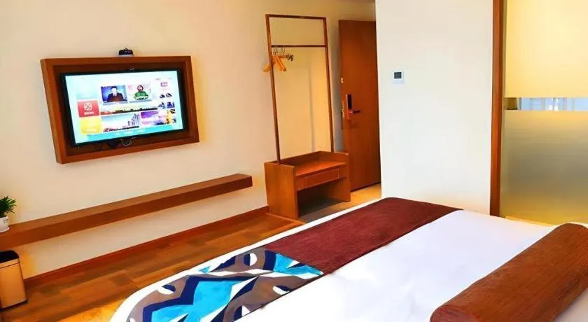 Bed in James Joyce Coffetel Guangyuan High-Speed Railway Station Dongba Municipal Government