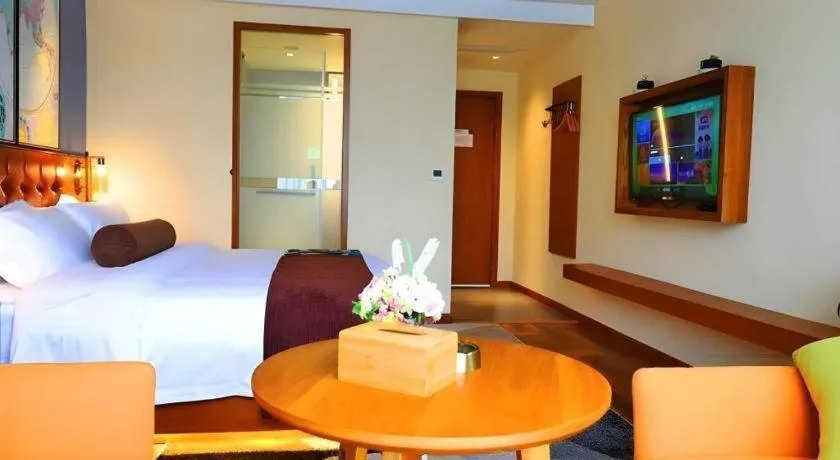 Bed in James Joyce Coffetel Guangyuan High-Speed Railway Station Dongba Municipal Government