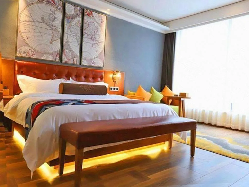 Bed in James Joyce Coffetel Guangyuan High-Speed Railway Station Dongba Municipal Government