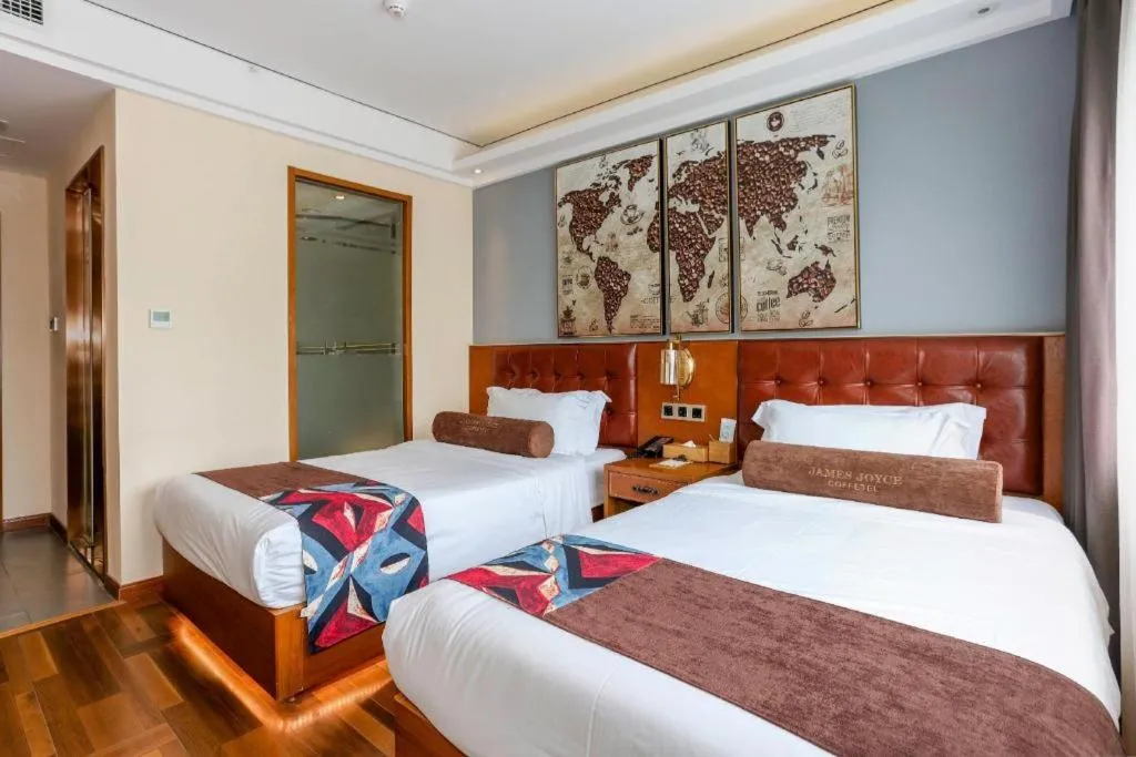 Bed in James Joyce Coffetel Guangyuan High-Speed Railway Station Dongba Municipal Government