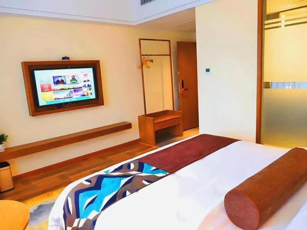 Bed in James Joyce Coffetel Guangyuan High-Speed Railway Station Dongba Municipal Government