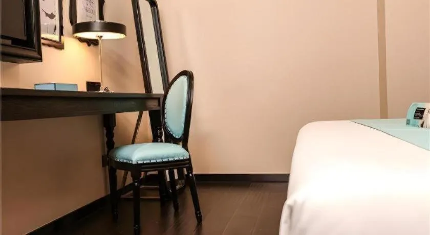 Bed in Xana Hotelle·Ji'nan Hi-tech Zone Century Avenue Tangye