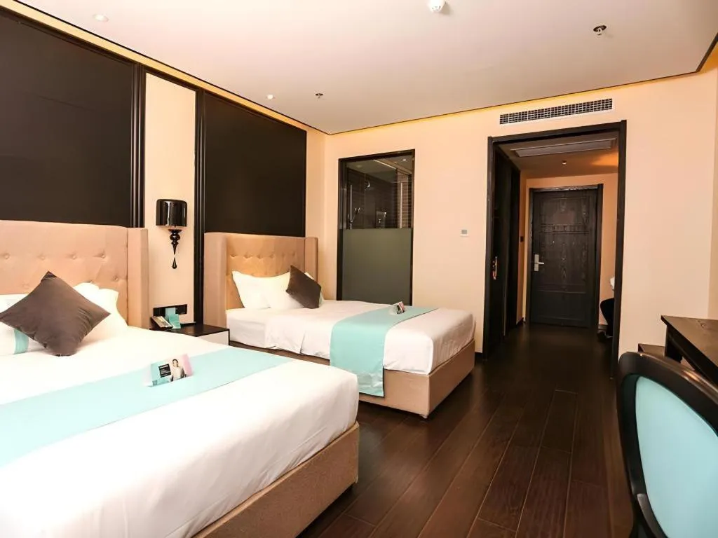 Bed in Xana Hotelle·Ji'nan Hi-tech Zone Century Avenue Tangye