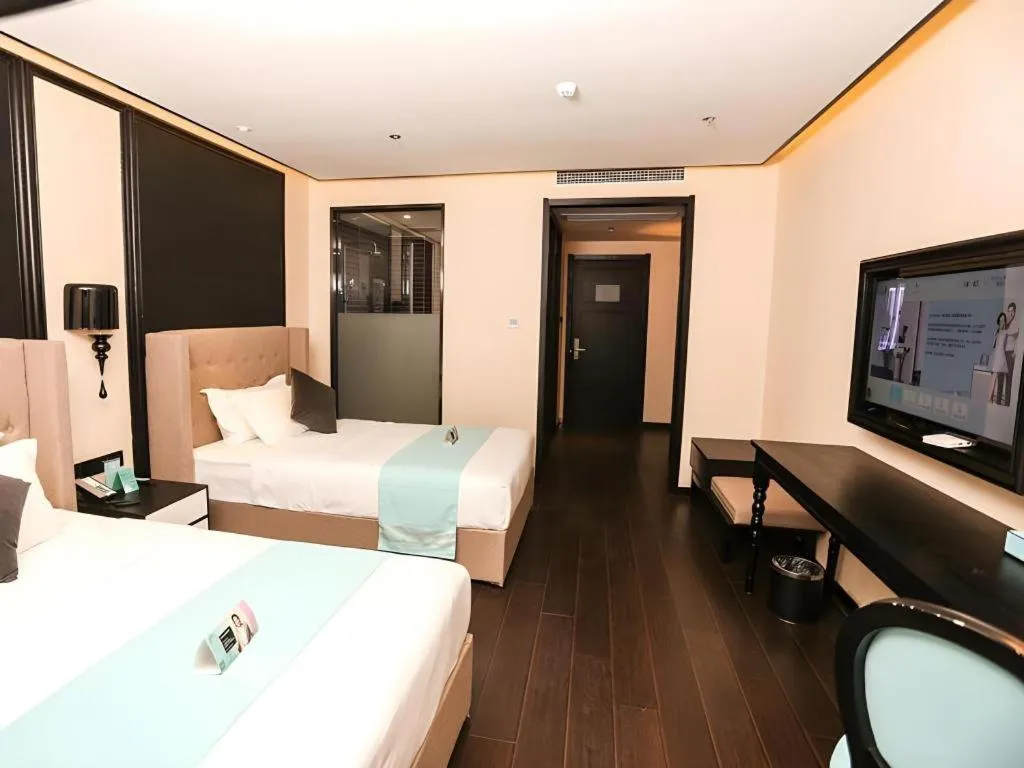 Bed in Xana Hotelle·Ji'nan Hi-tech Zone Century Avenue Tangye