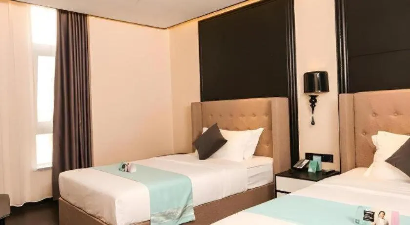 Bed in Xana Hotelle·Ji'nan Hi-tech Zone Century Avenue Tangye