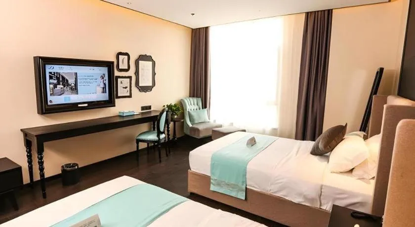 Bed in Xana Hotelle·Ji'nan Hi-tech Zone Century Avenue Tangye