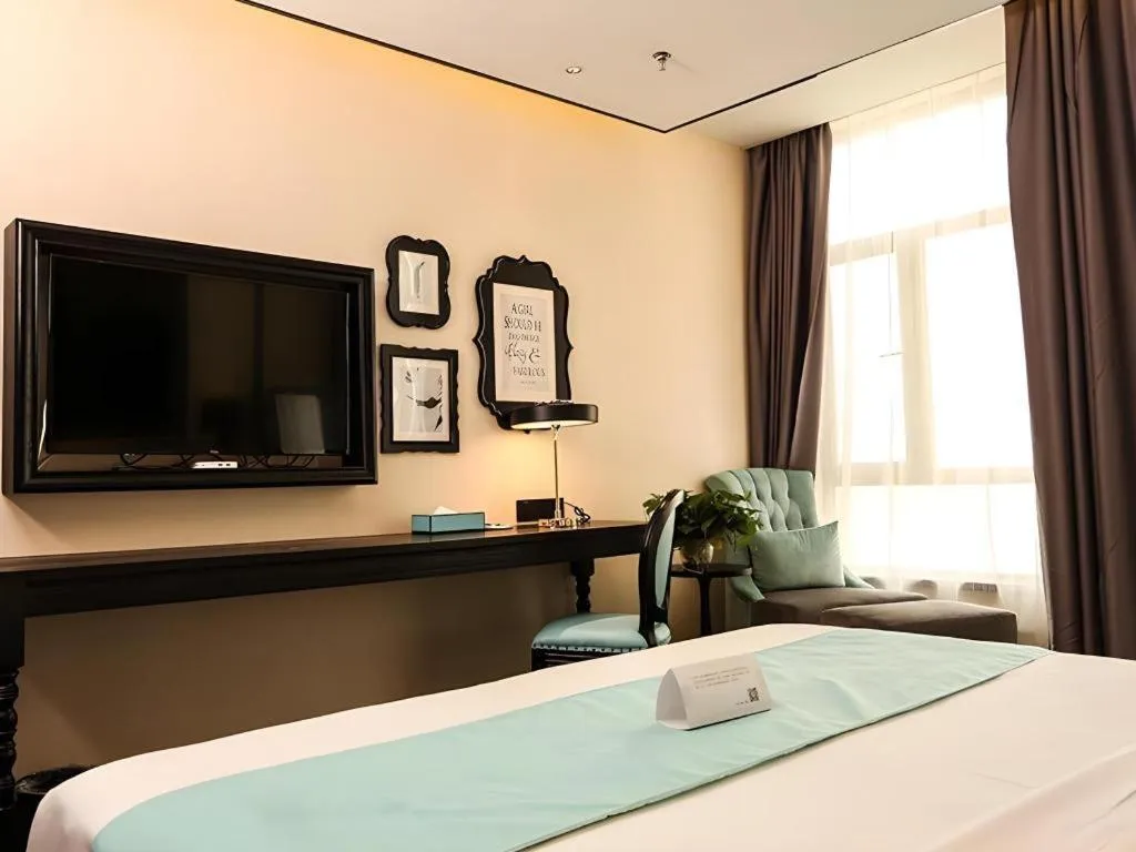 Bed in Xana Hotelle·Ji'nan Hi-tech Zone Century Avenue Tangye