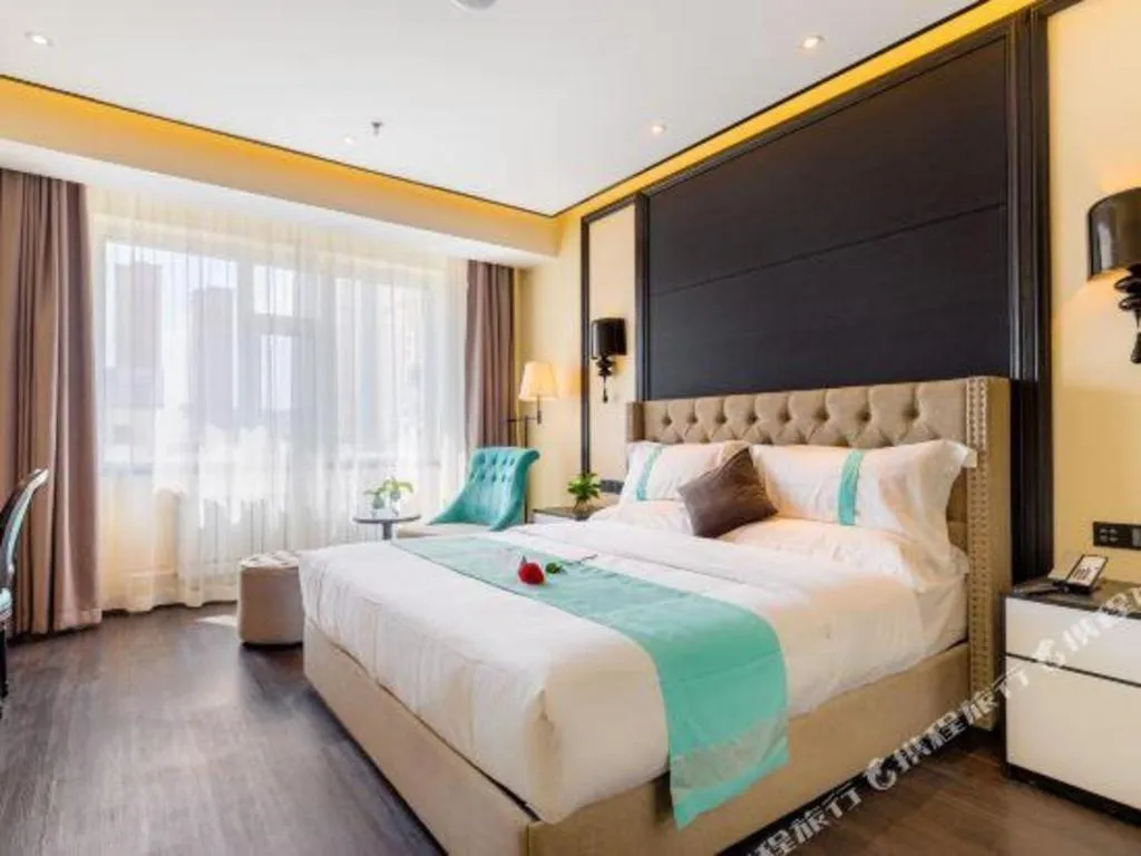 Bed in Xana Hotelle·Ji'nan Hi-tech Zone Century Avenue Tangye