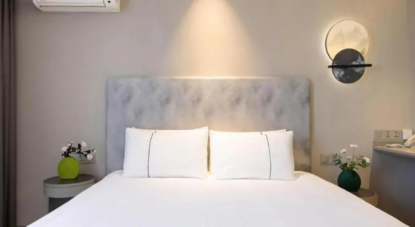 Bed in Magnotel Hotel Dandong Railway Yalv River